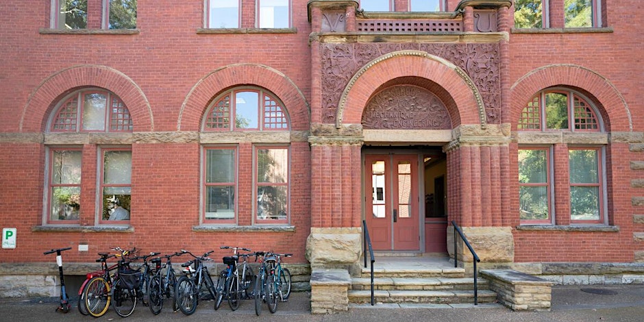 brick building with bikes outside